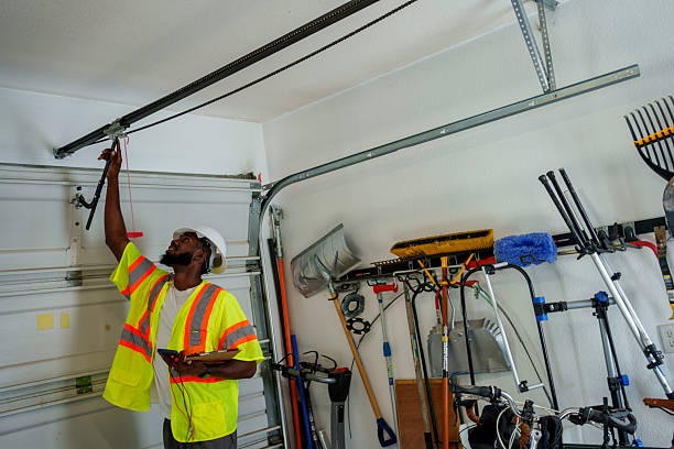 Professional Garage Door Panel Replacement technician working in Audubon, IA